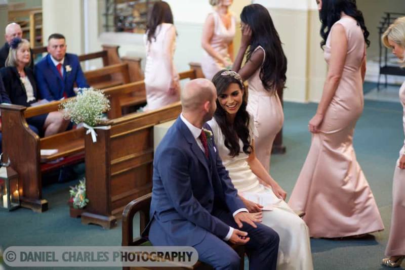 bride laughing with groom in liverpool wedding photograph