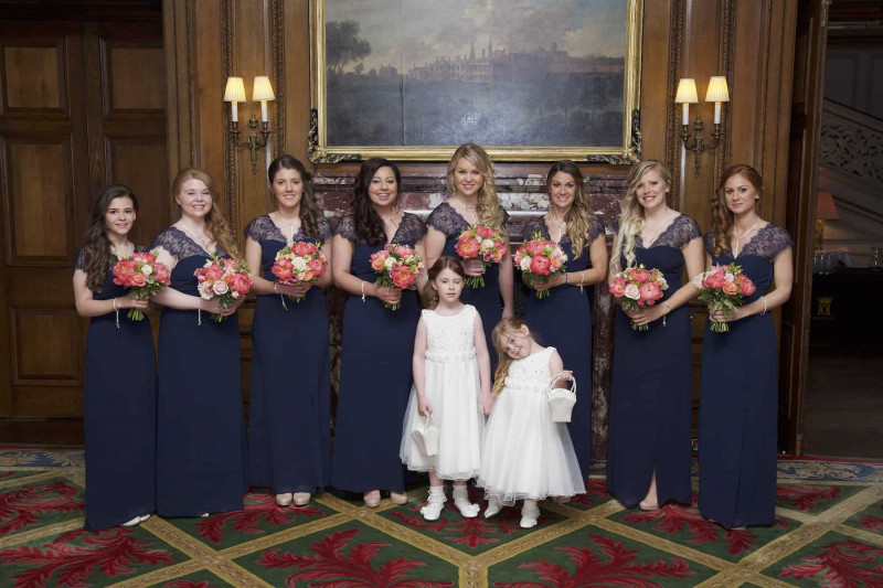 bridesmaids standing in lobby  of Knowsley Hall