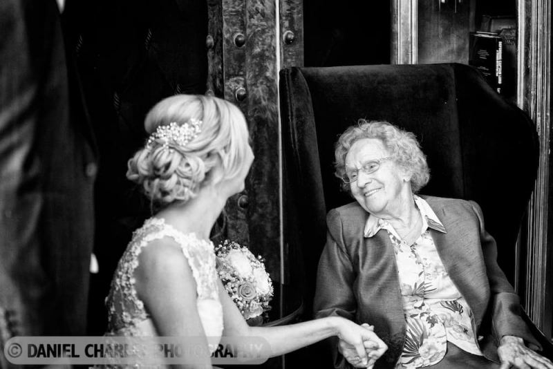 black and white wedding photo of bride and grandmother