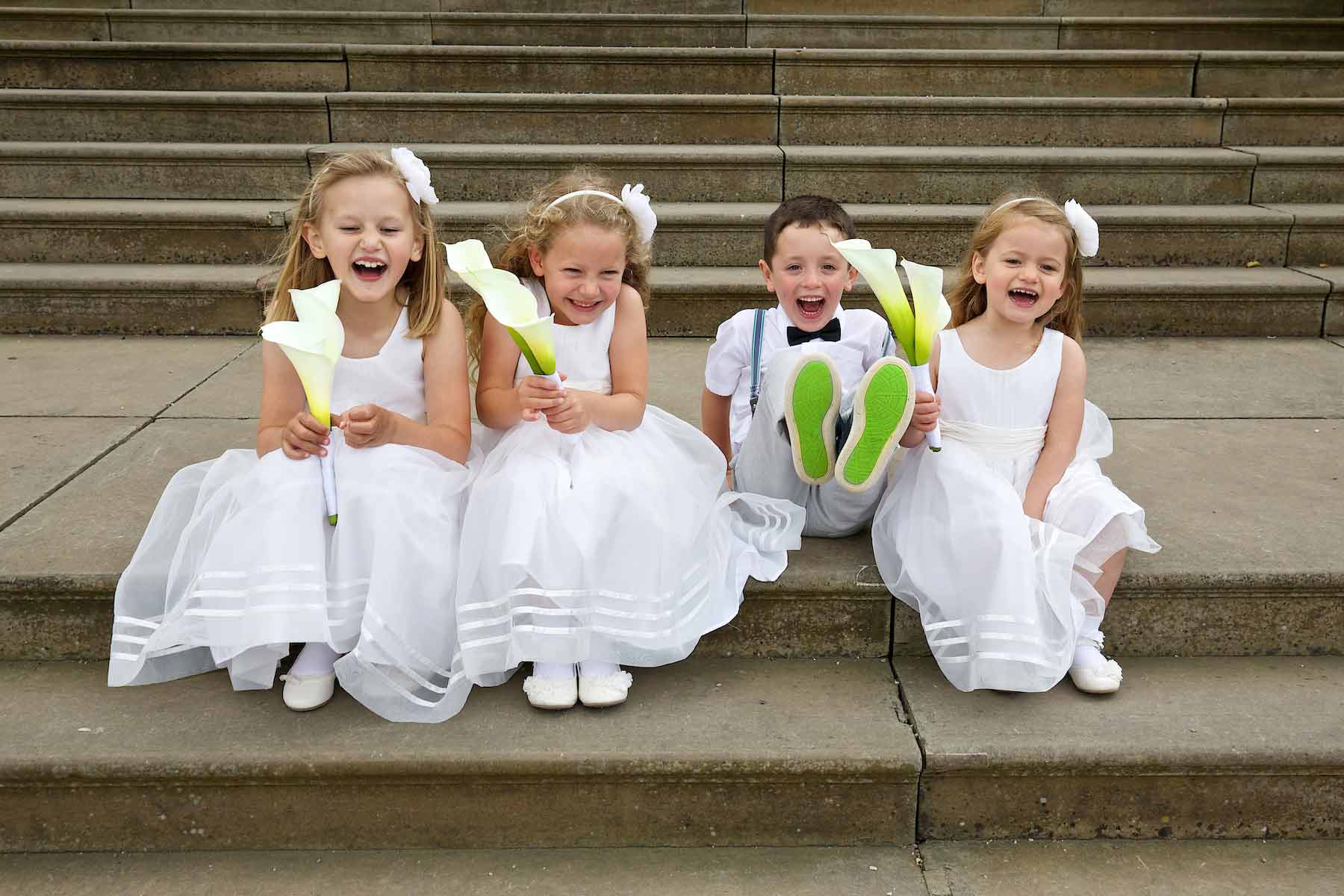 kids laughing on steps at Knowsley Hall